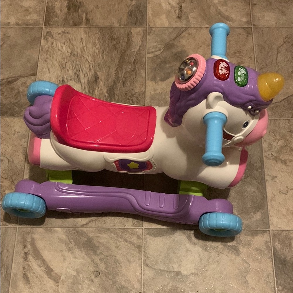 V-TECH brand baby’s Colorful Unicorn Ride-On Toy Music 🎶 & light up 😊
